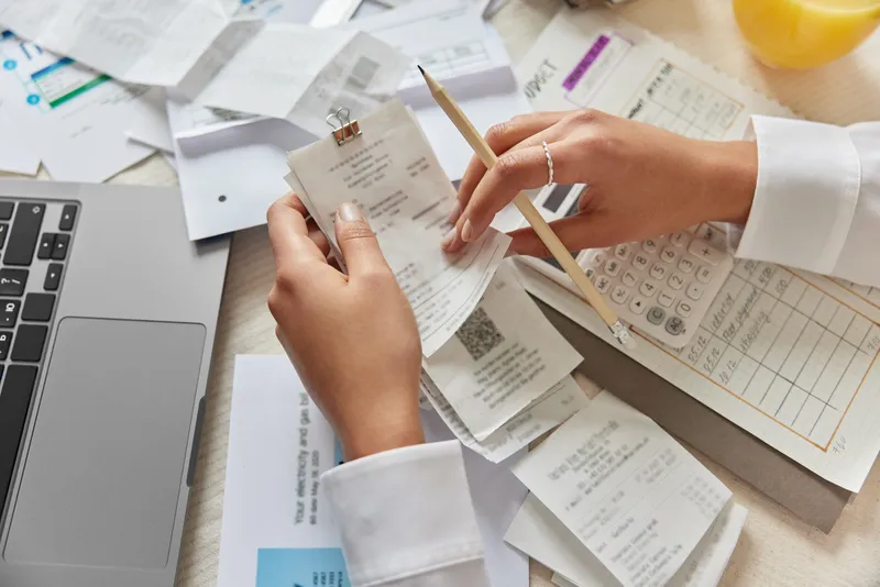 Source documents and accounting software used in monthly bookkeeping reconciliation